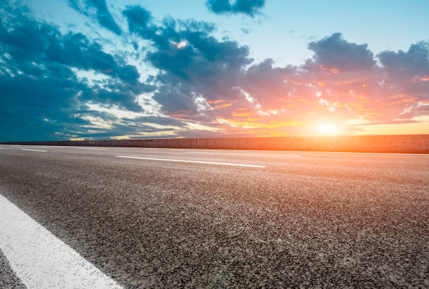 istock Asphalt road and sky at sunset 661488446