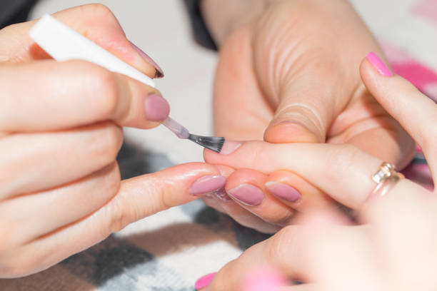 istock professional manicure in a beauty salon 661488882