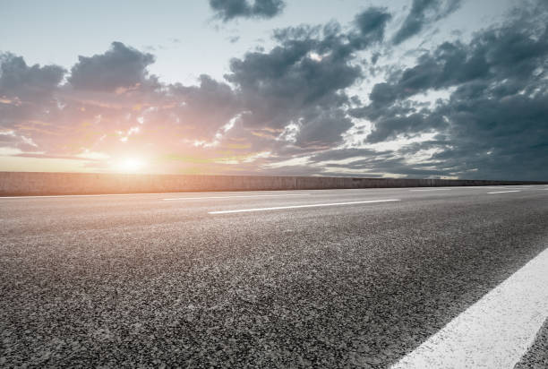istock Asphalt road and sky at sunset 661489134