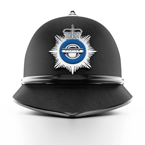 British traditional police hat  isolated on white British traditional police hat  isolated on white. metropolitan police stock pictures, royalty-free photos & images