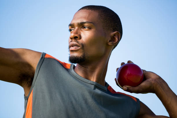 istock Athlete about to throw shot put ball 661511106
