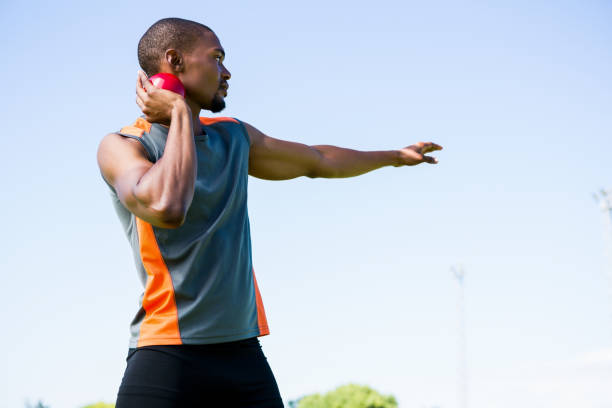 istock Athlete about to throw shot put ball 661513292