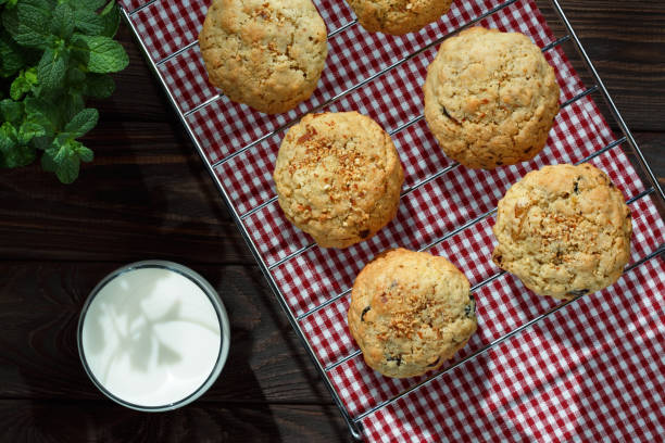 istock Homemade biscuits with a cup of milk, close view. 661513886