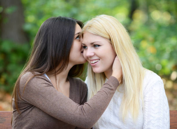istock Girls gossiping 661515018