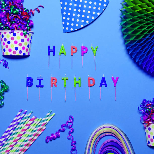istock Happy Birthday flat lay with party decorations on blue background 661515916