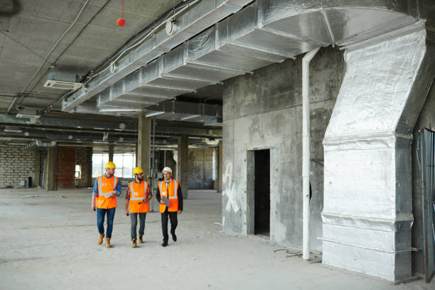 istock Workers with Inspector in Basement Floor at Construction Site 661522504