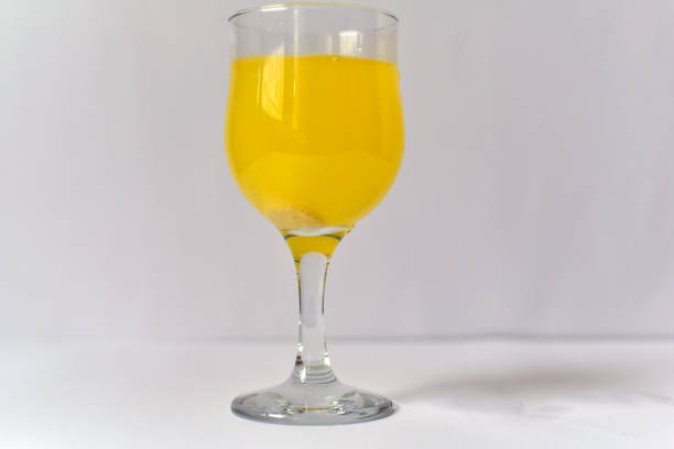 istock An effervescent tablet drops into a glass of water 661522570