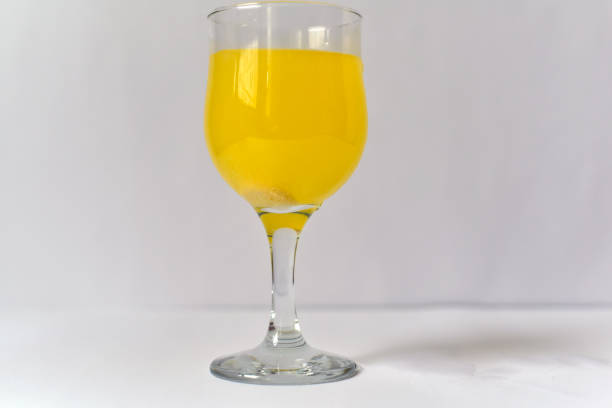 istock An effervescent tablet drops into a glass of water 661522864