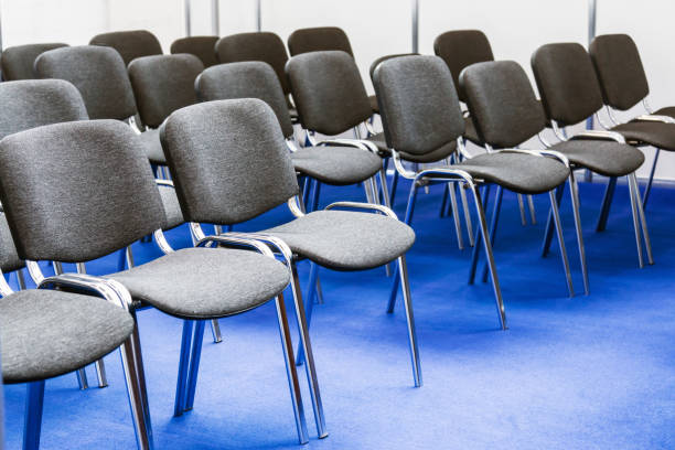 istock Rows of chairs at a conference 661531200
