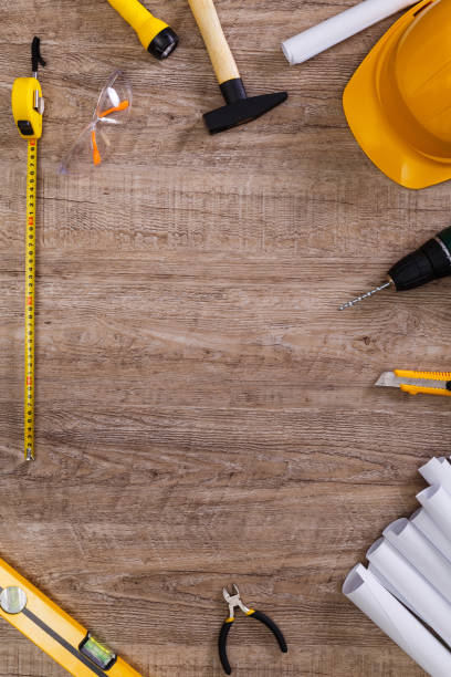 istock Helmet, flashlight and tape measure. Drill. 661532810