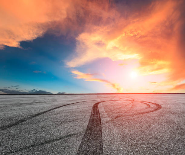 istock Asphalt road and sky at sunset 661537382