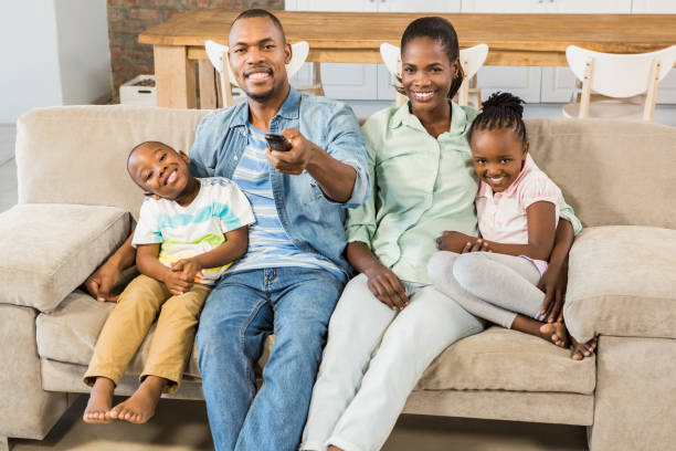 istock Happy family relaxing on the couch 661546988