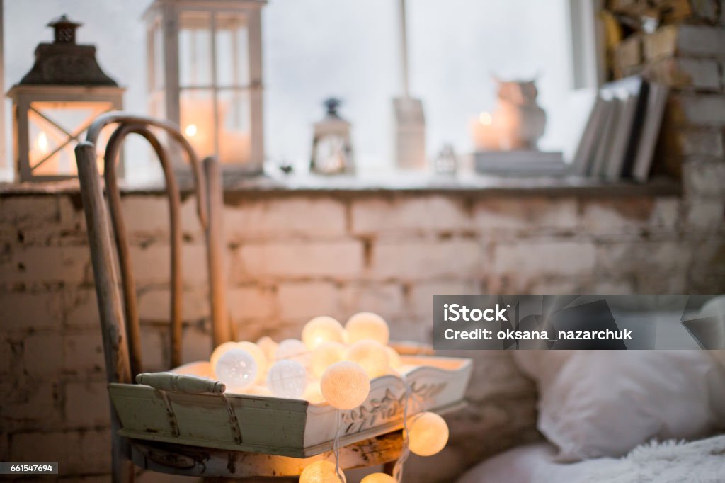 winter decor winter decor with candles and garland Atmospheric Mood Stock Photo