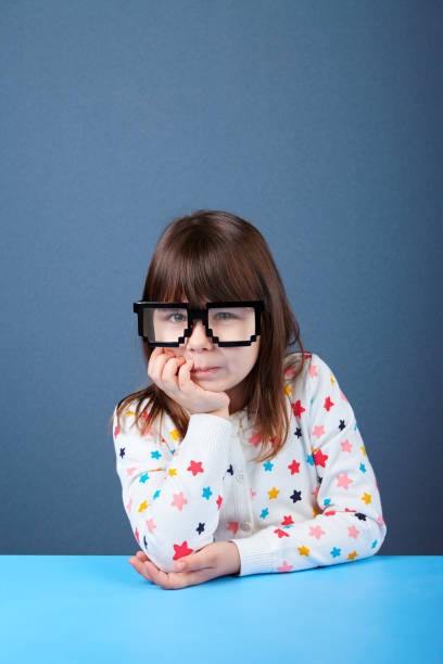 istock Cute 5 years old girl looking up 661563004