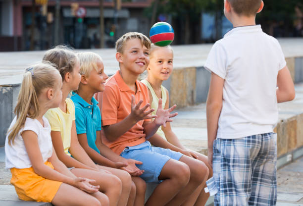 istock children playing with small ball outdoor 661563786