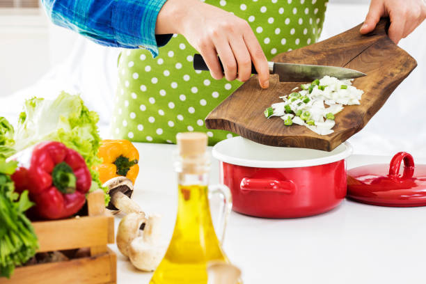 istock Woman cooking in the kitchen 661575008