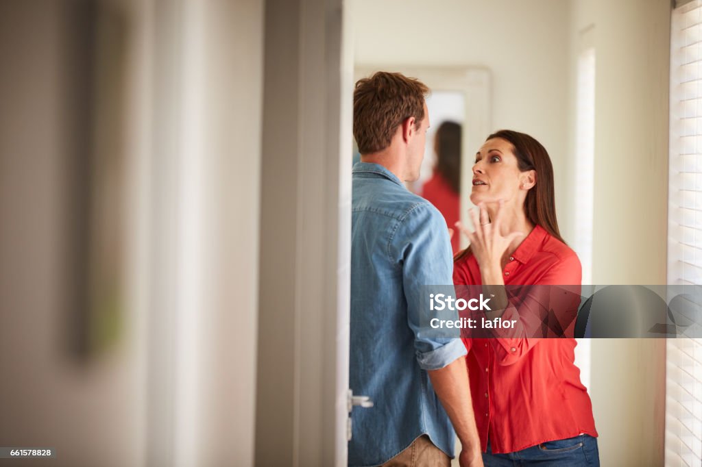 You just never seem to listen to me! Shot of a mature couple having relationship problems at home Arguing Stock Photo