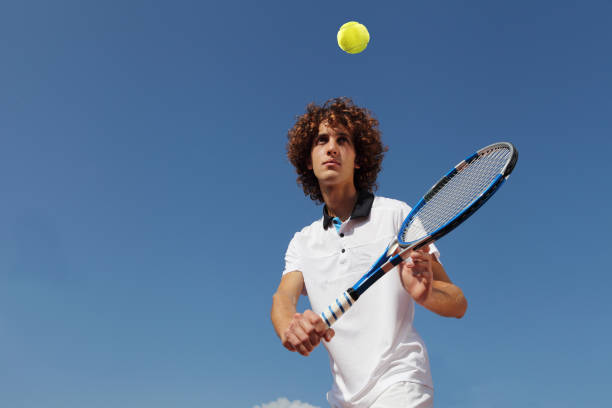 istock tennis player with racket during a match game 661591124