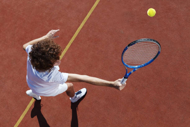 istock tennis player with racket during a match game 661591130