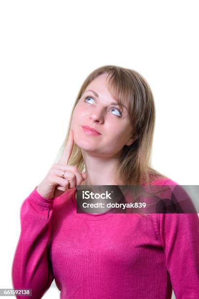 Portrait Of A Pensive Girl Finger At The Cheek Stock Photo - Download Image Now - Adult, Adults Only, Beautiful Woman