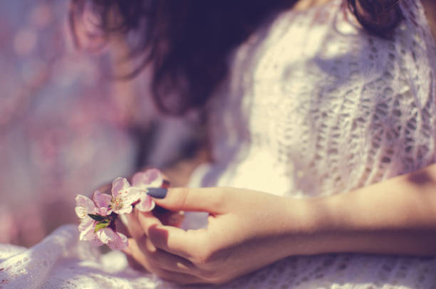 Young woman in nature in spring