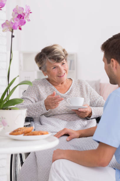 istock Grandmother talking with caregiver 661656530