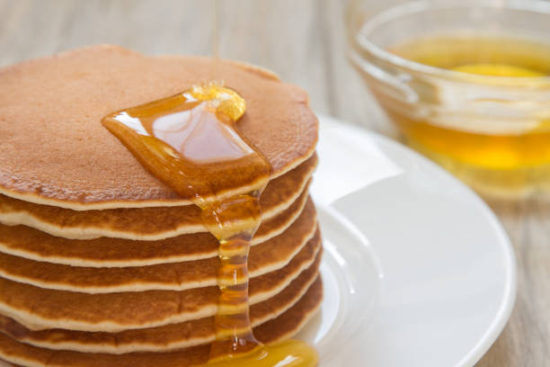 istock Fresh and delicious pancake with honey 661671486