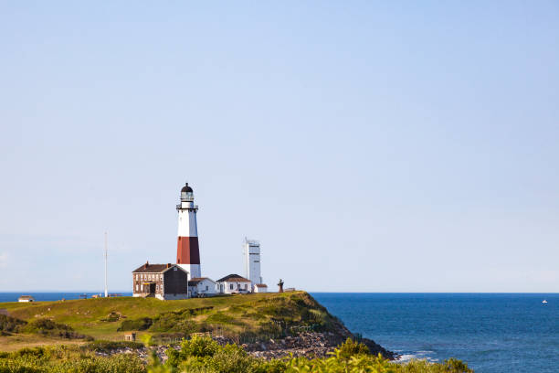 istock Montuak Lighthouse, Cliff and Ocean 661671654
