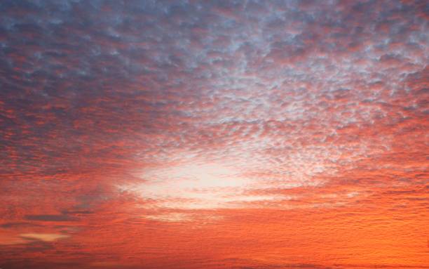 istock Dramatic colorful orange color sky with clouds in the evening during sunset 661682014