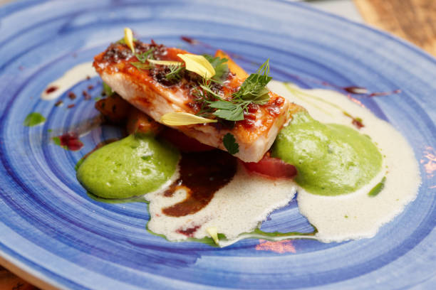 istock Chicken fillet on blue porcelain plate 661691892