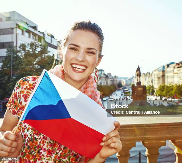 Smiling Woman On Vaclavske Namesti In Prague Showing Flag Stock Photo - Download Image Now