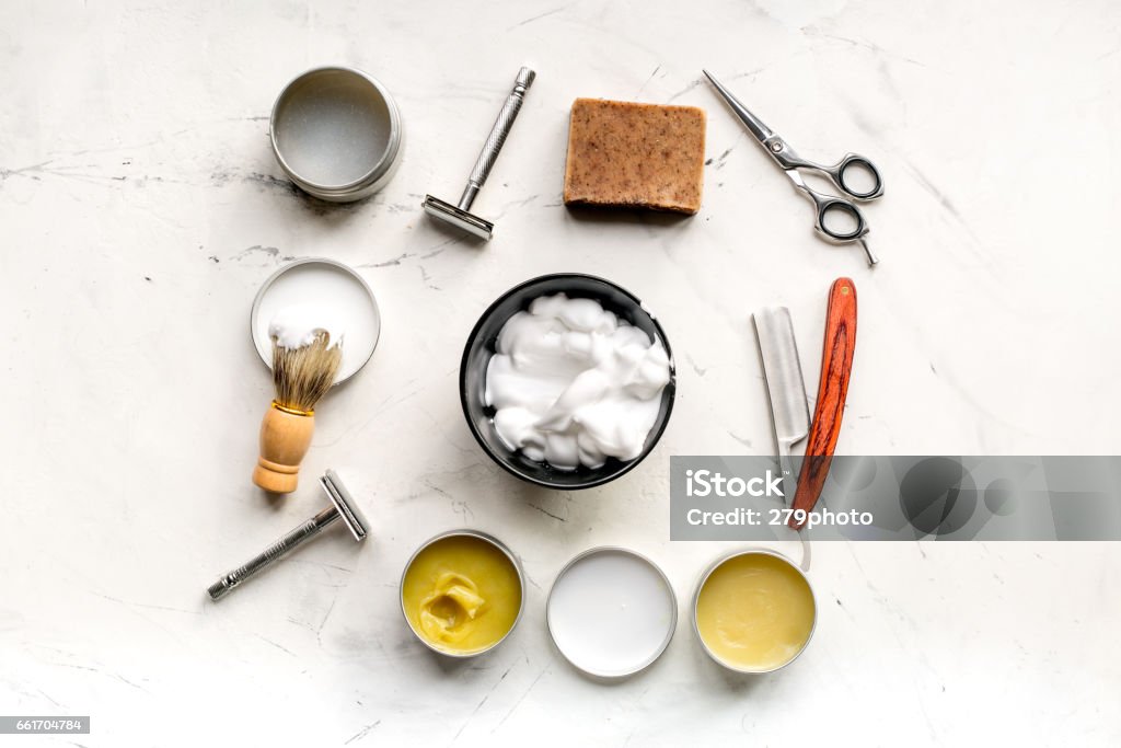 babrer workplace with tools on white background top view babrer workplace with tools for shaving on white table background top view Men Stock Photo