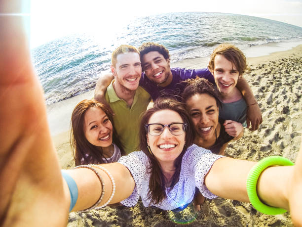 istock Friends on the beach during vacations 661711470