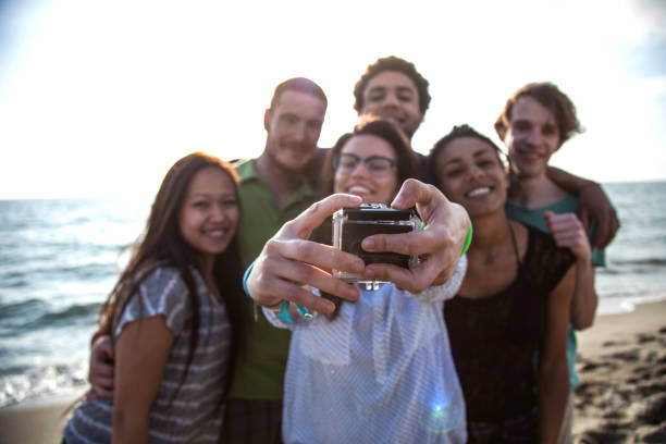 istock Friends on the beach during vacations 661737966