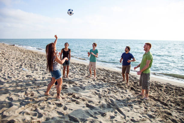 istock Friends on the beach during vacations 661749436