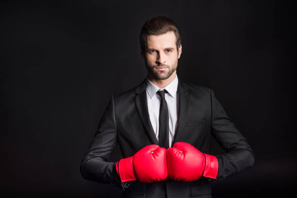 istock Businessman in boxing gloves 661797228