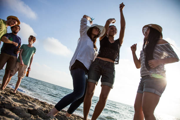 istock Friends on the beach during vacations 661798166