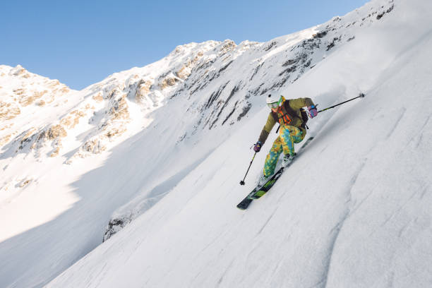 istock Man skiing downhill steep slope 661798552