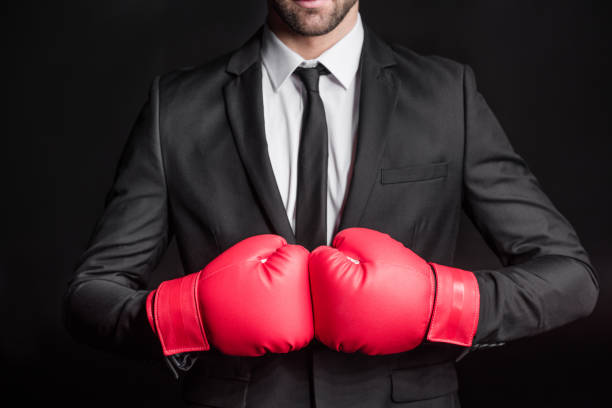 istock Businessman in boxing gloves 661799914