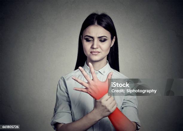 Woman Holding Her Painful Wrist Stock Photo - Download Image Now - Adult, Adults Only, Anatomy