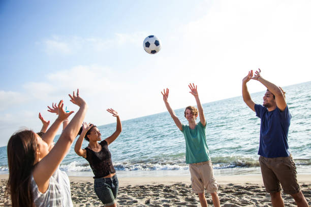 istock Friends on the beach during vacations 661840442