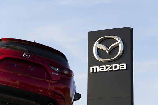 Prague, Czech republic - February 31, 2017: Mazda 3 car in front of dealership building on March 31, 2017 in Prague, Czech republic. Mazda set to launch new electric vehicle range by 2019.