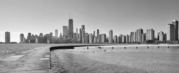 istock Black and white panoramic view of Chicago waterfront skyline. 661854230
