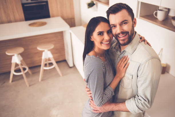 istock Beautiful couple in kitchen 661860204