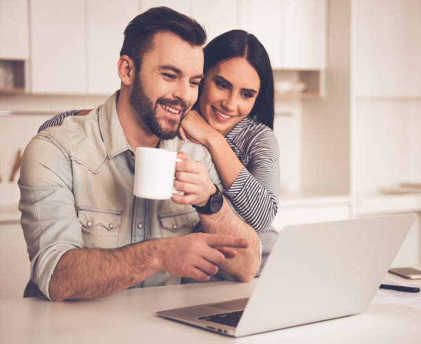 istock Beautiful couple in kitchen 661861590