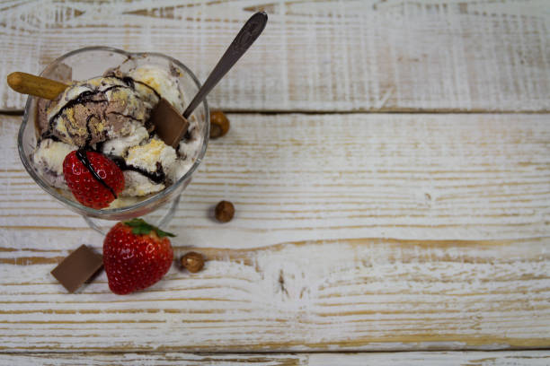 istock Ice Cream in a bowl on wooden background 661862474