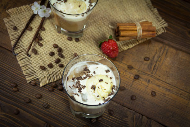 istock Ice coffe on wooden background 661868336