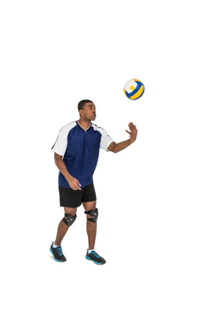 istock Sportsman playing a volleyball 661869744