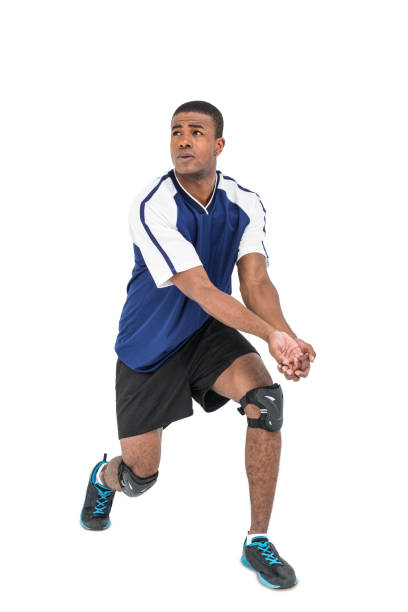 istock Sportsman posing while playing volleyball 661870464