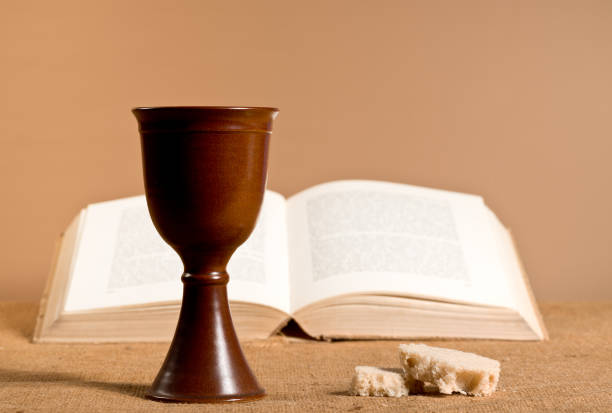 istock Chalice Of Wine With Bread On The Table 661880398